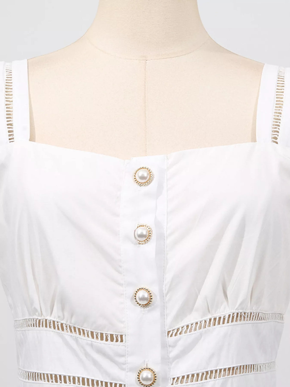 White eyelet embroidery fabric detail
