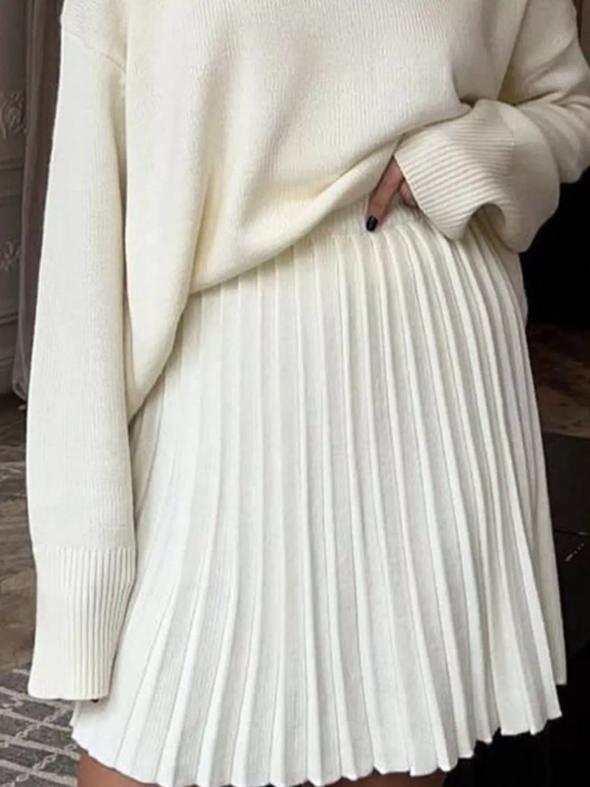 Pleated skirt detail