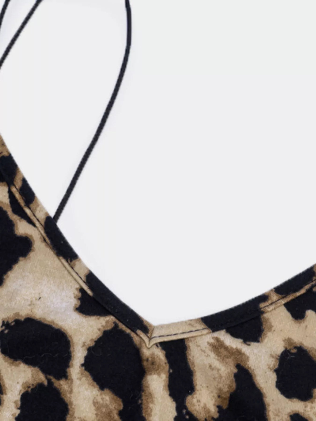 Snake pattern fabric close up on the midi dress