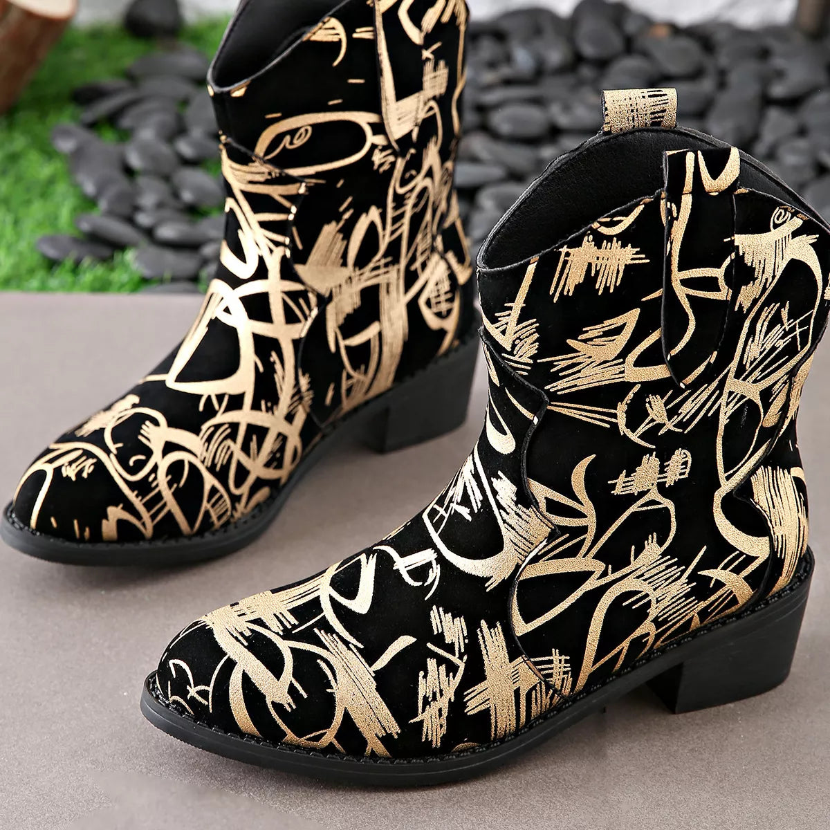 Black suede block heel boots sole and tread
