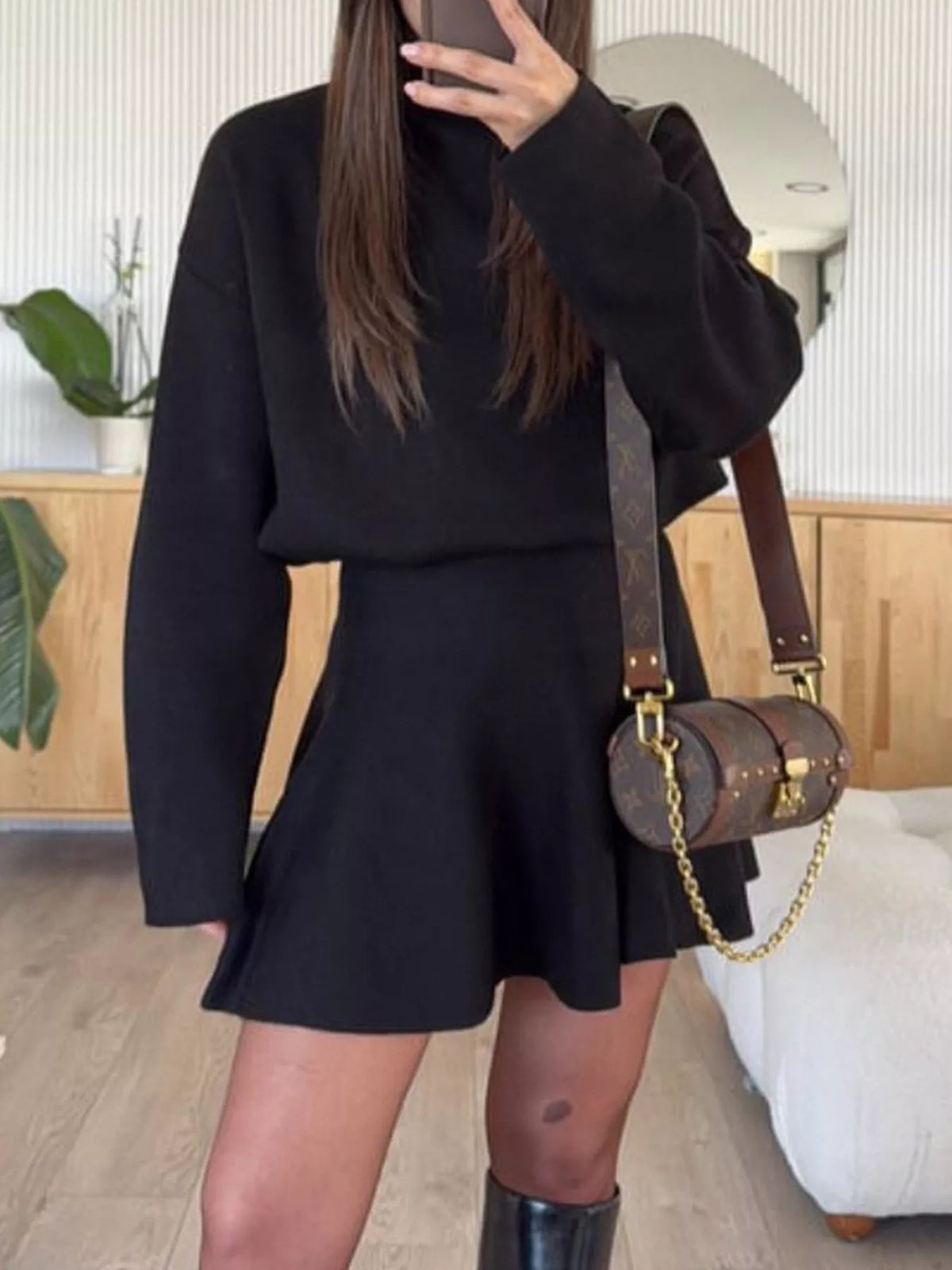 Round neck long sleeve sweater dress three quarter view