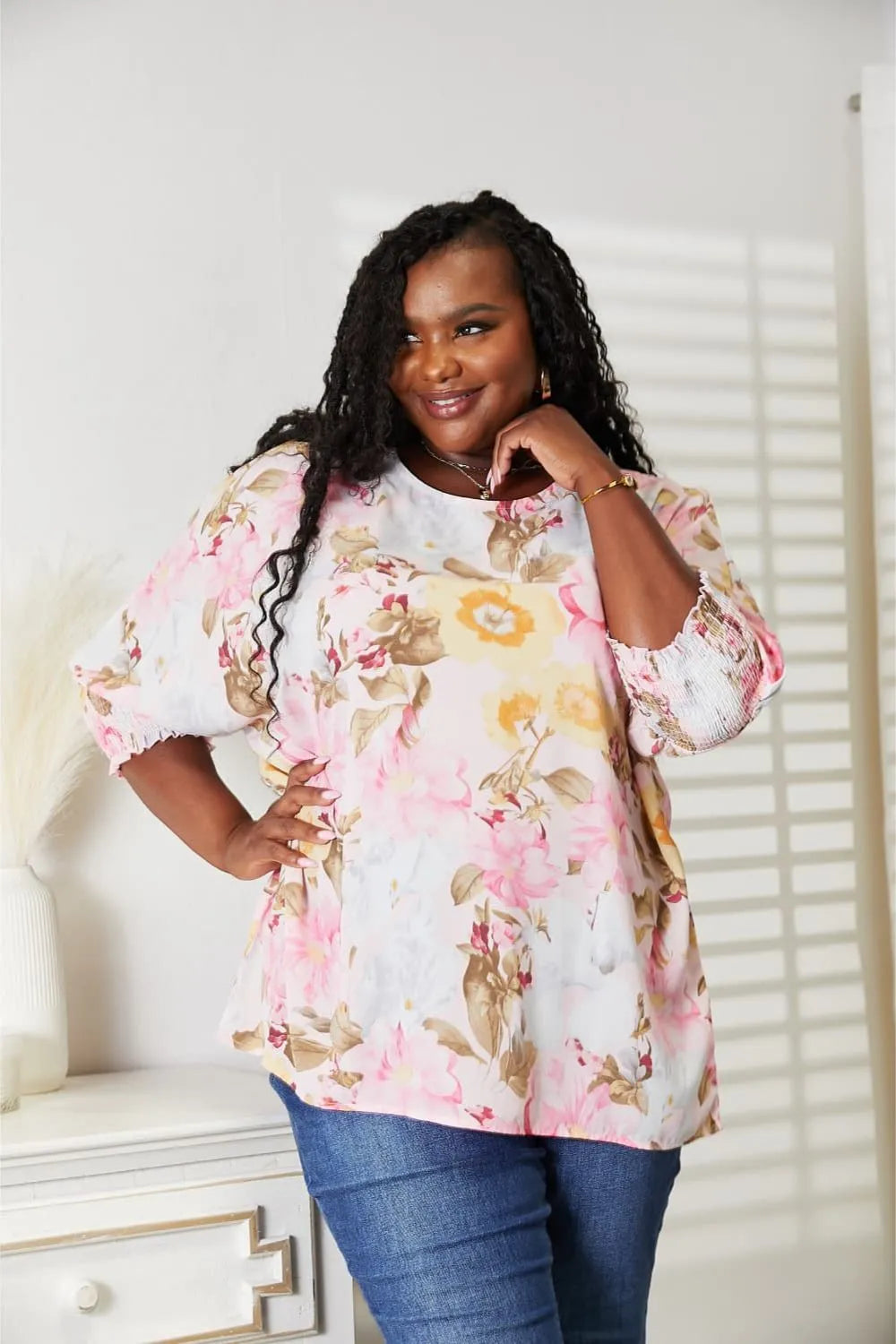 Blush pink floral top full length on model