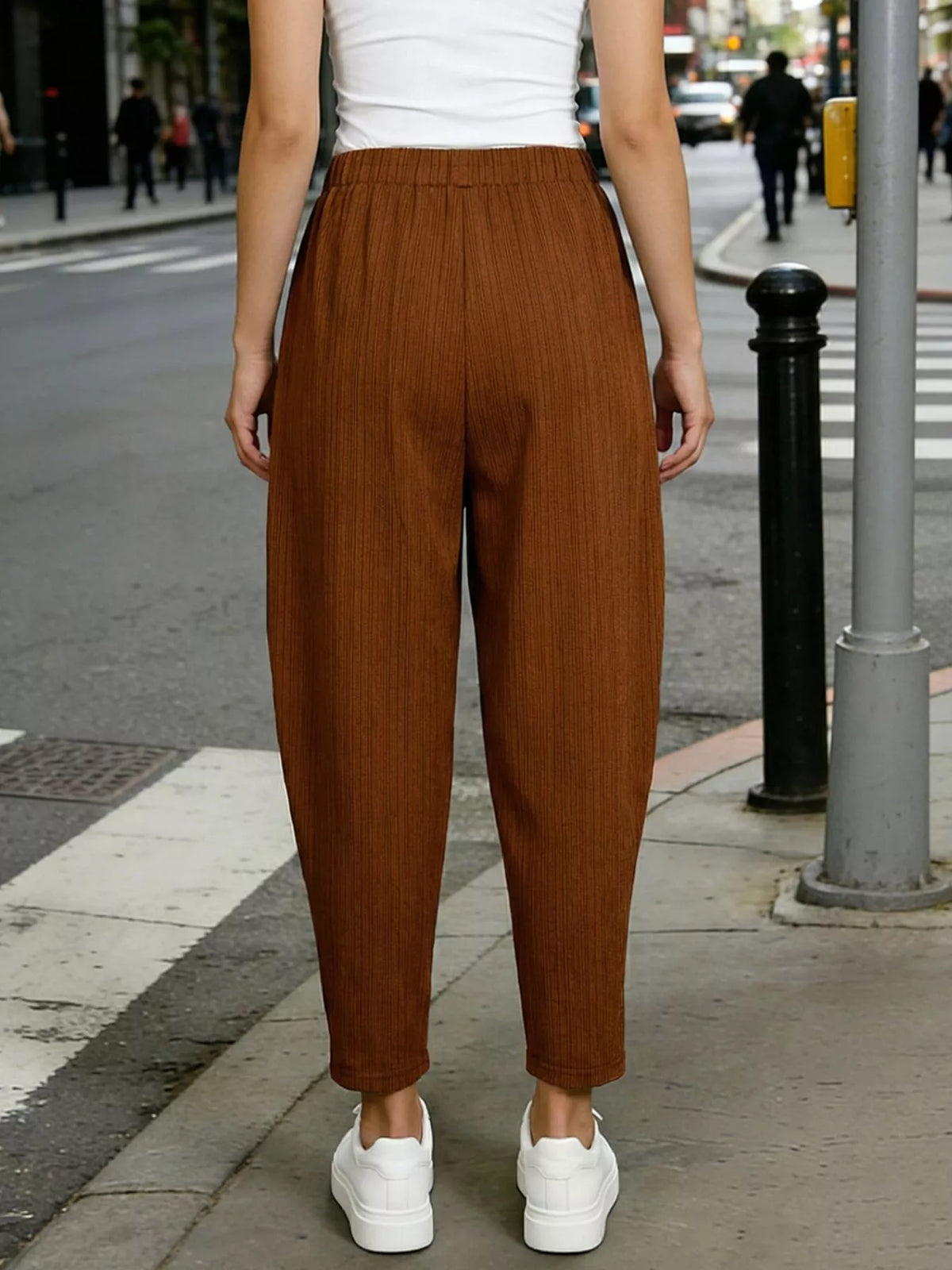 Plus size elastic waist harem pants, angled view