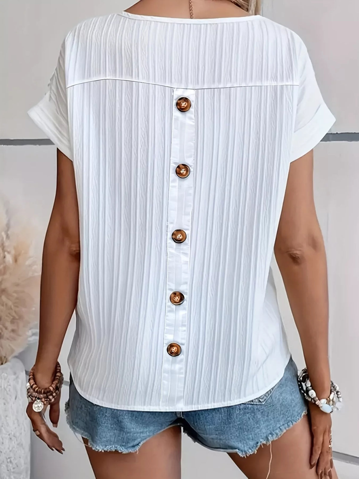 White tee styled with denim