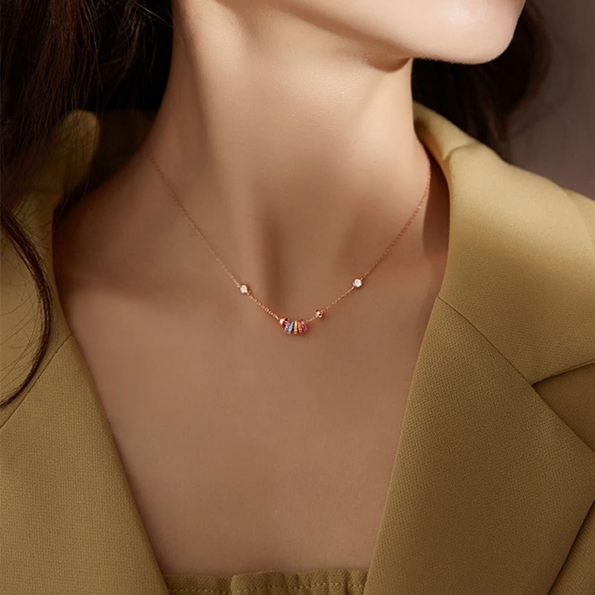 Circle pendant close up showing the zircon detail