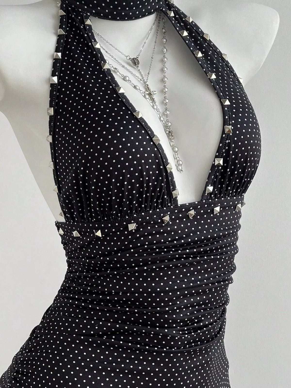 Black polka dot cutout mini dress ruffle trim detail