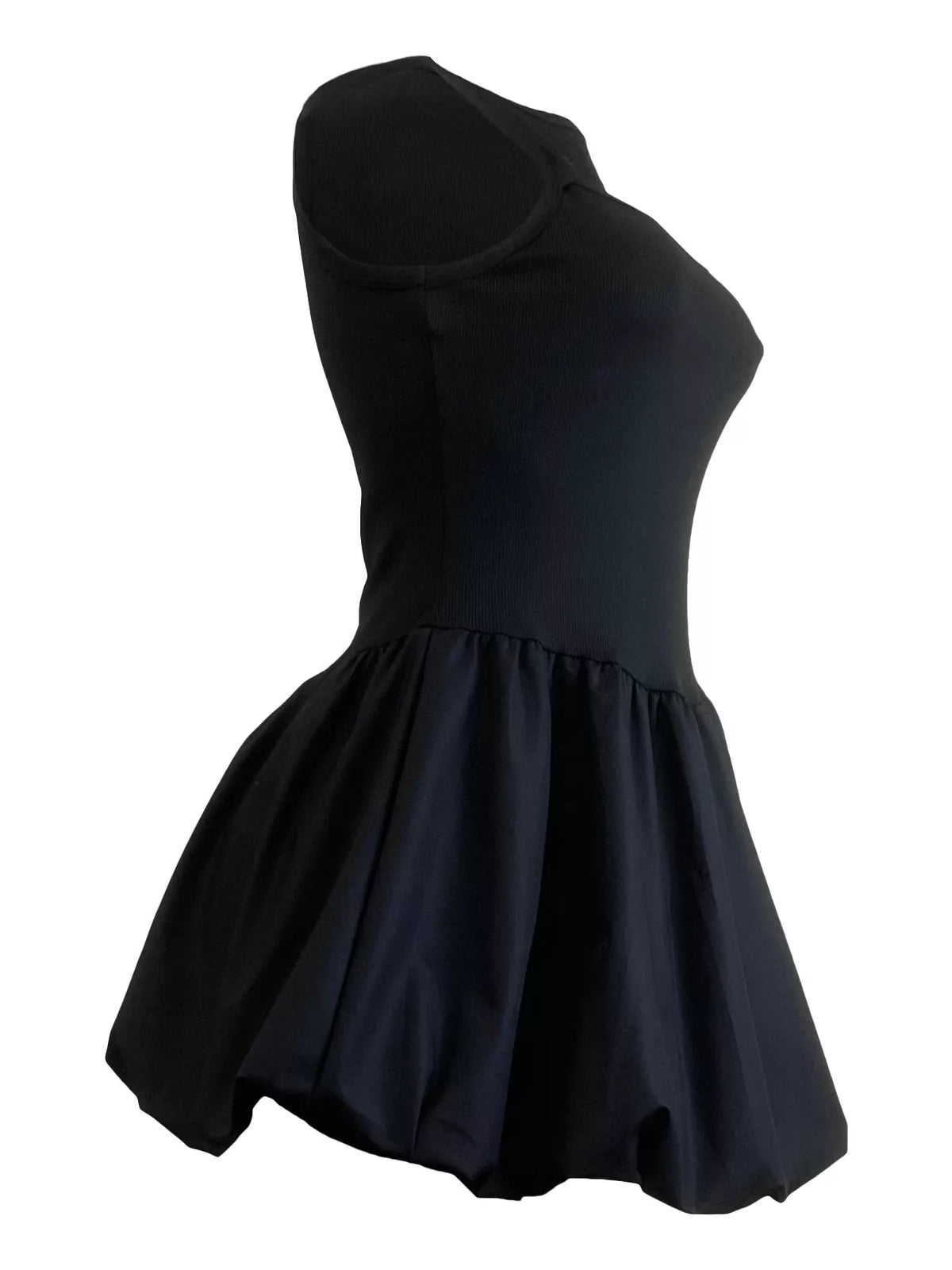 Waist and cutout detail on the short black dress