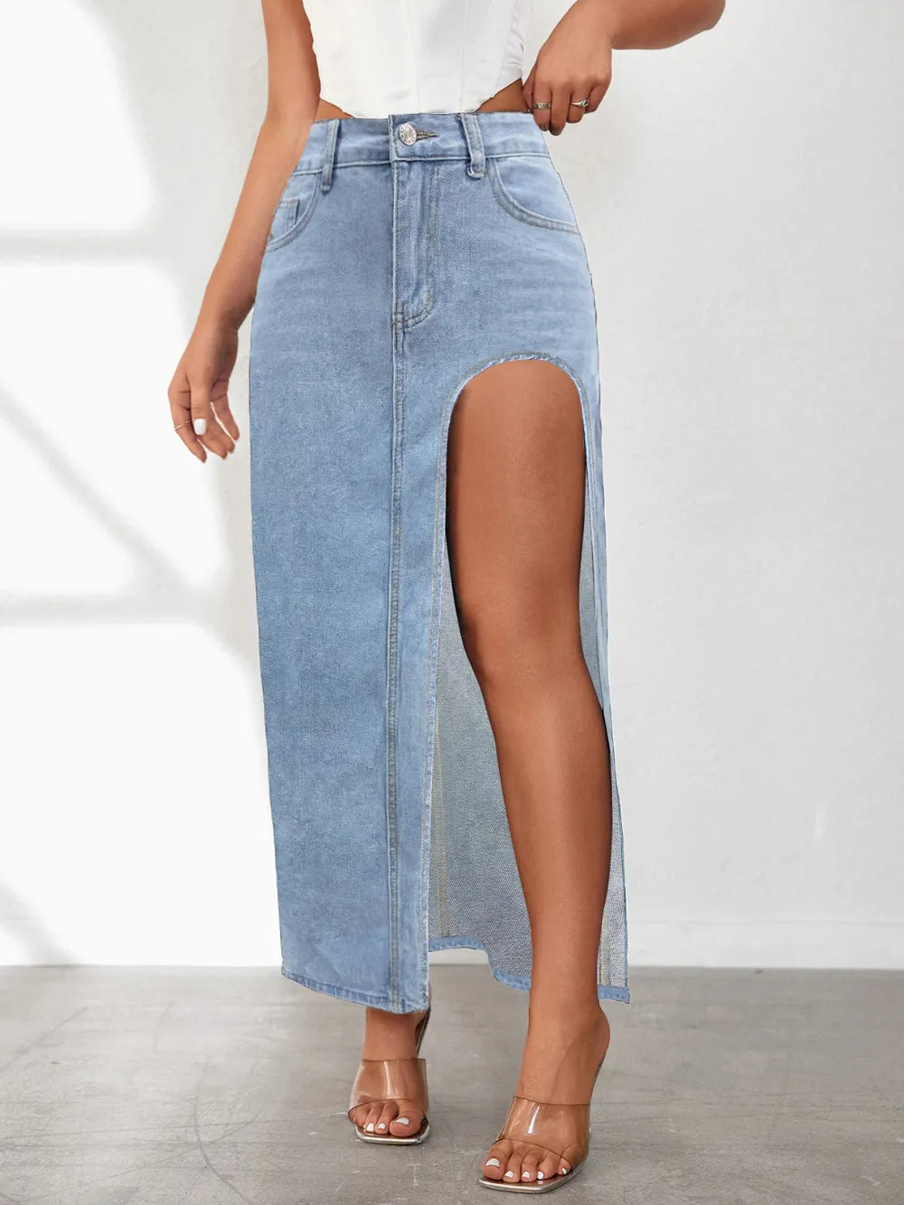Slit denim skirt styled outfit