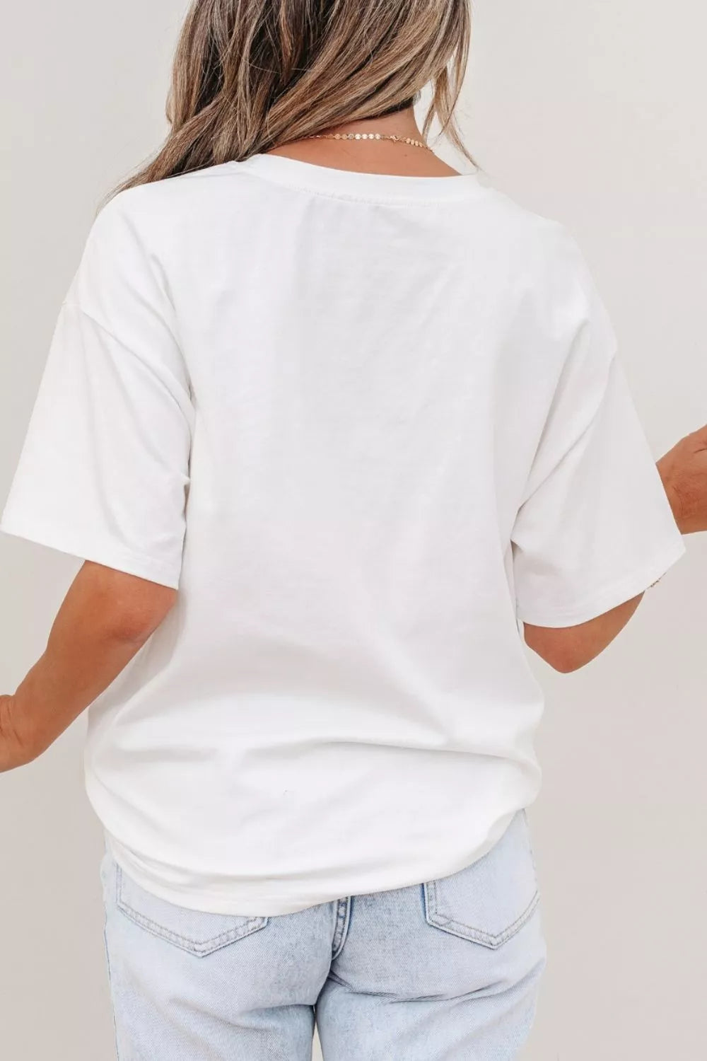 White color block short sleeve top with chest pocket back view