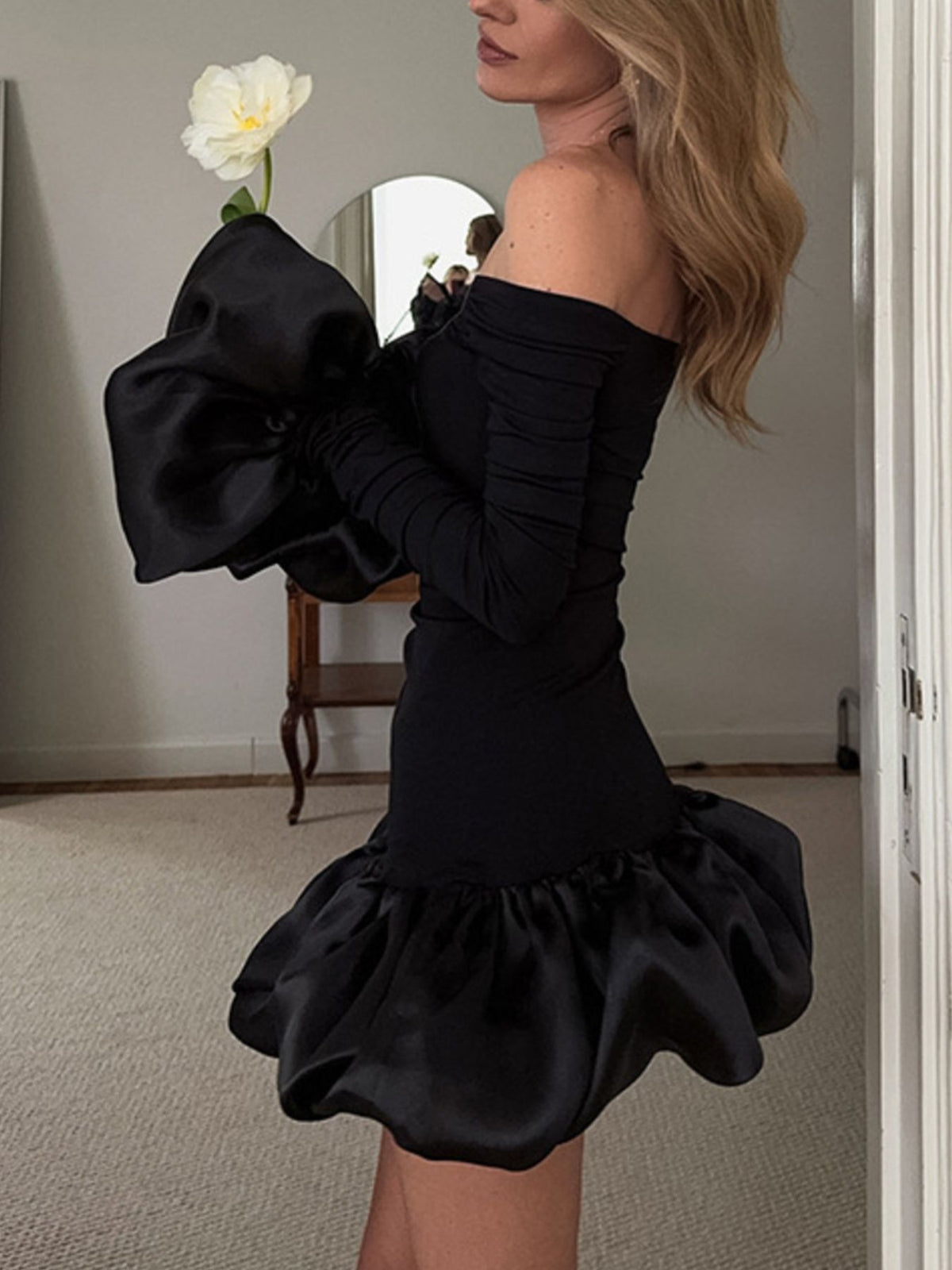 Black off shoulder ruffle hem mini dress styled look