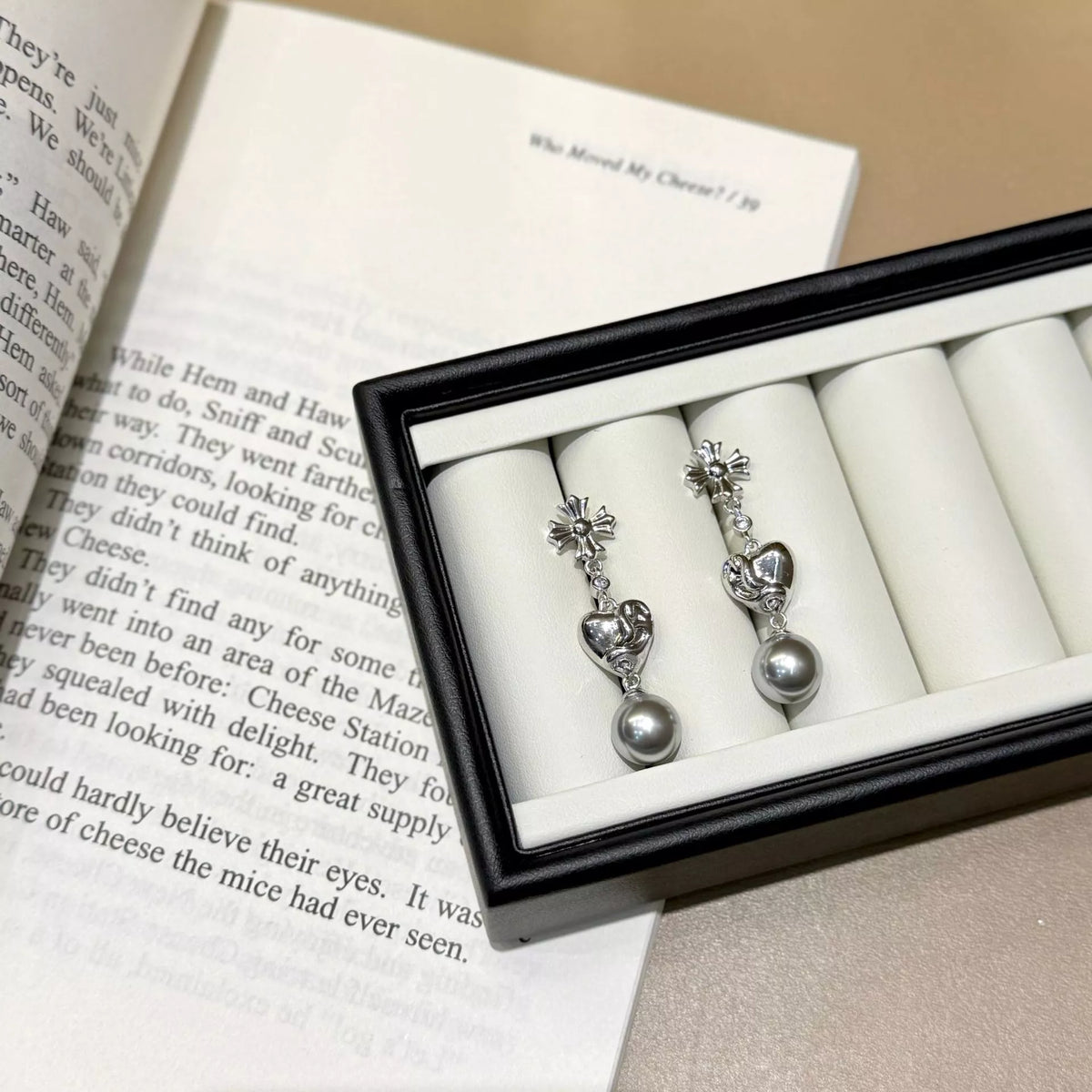 Pearl heart drop earrings styled view