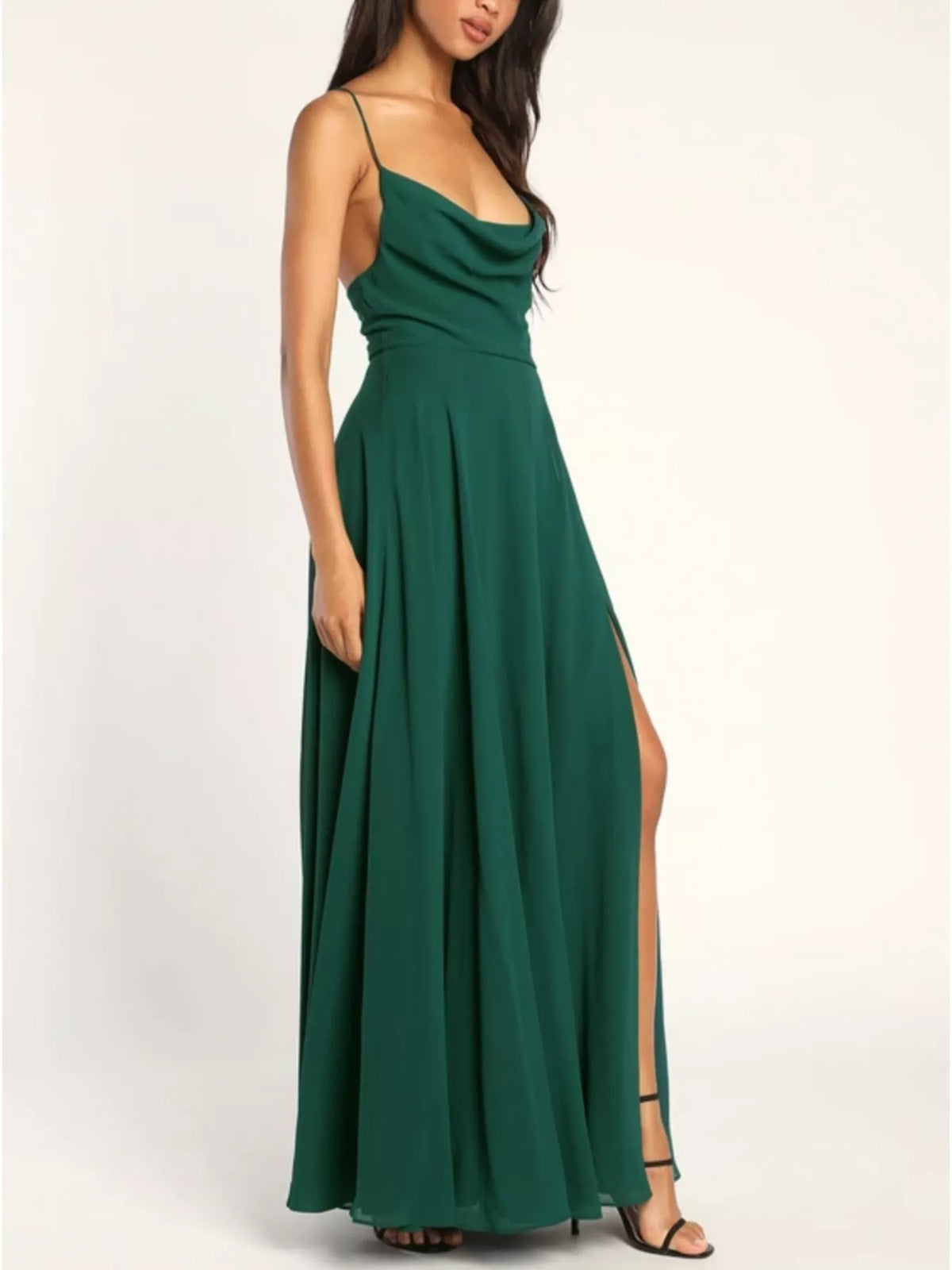 Model seated wearing the cowl neck maxi dress