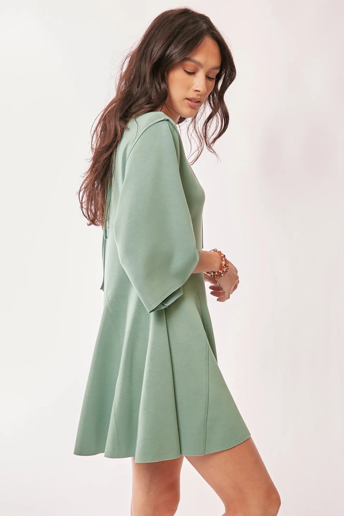 Sage green skort romper side view