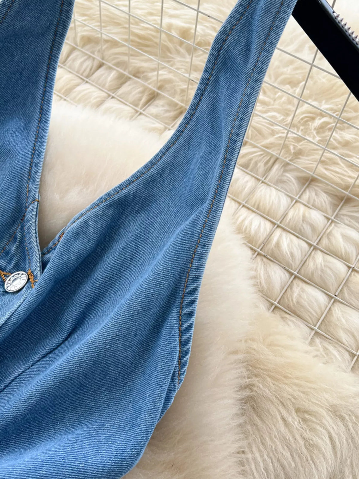 Blue halter neck button down denim dress side view