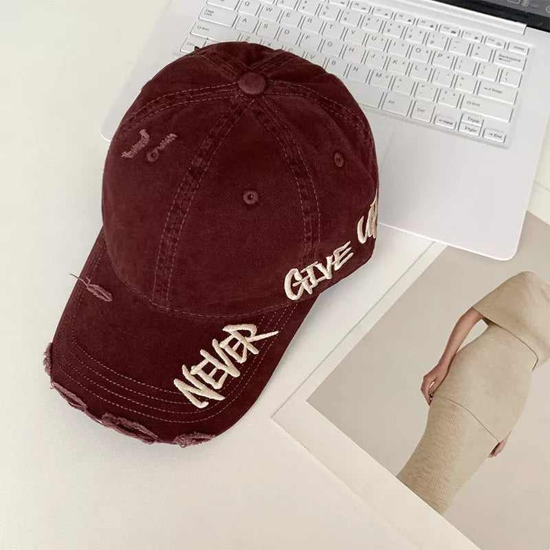Distressed cotton cap color options laid flat
