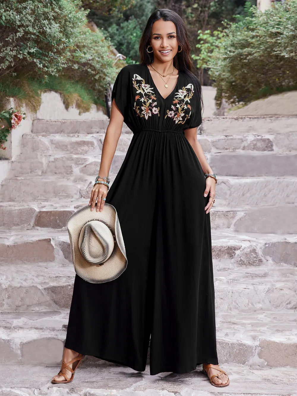 Short sleeve black jumpsuit back view