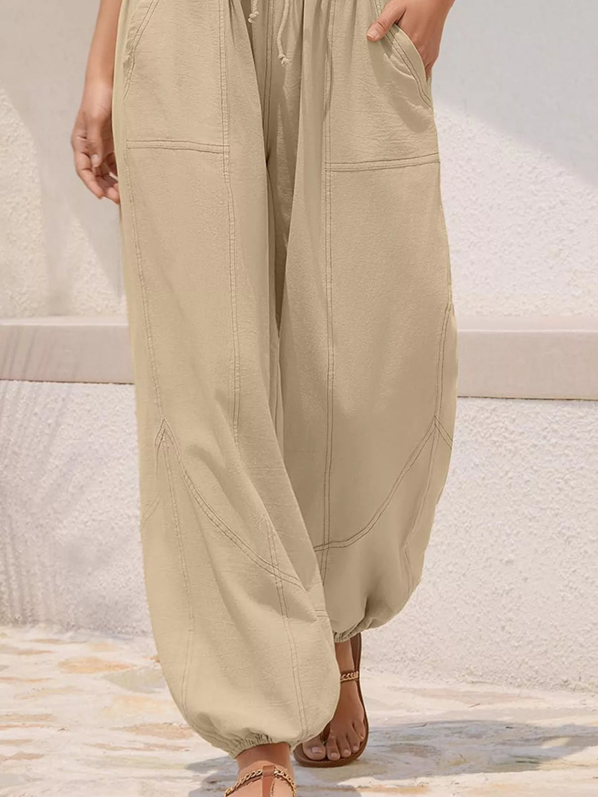 Loose fit drawstring waist harem joggers front view