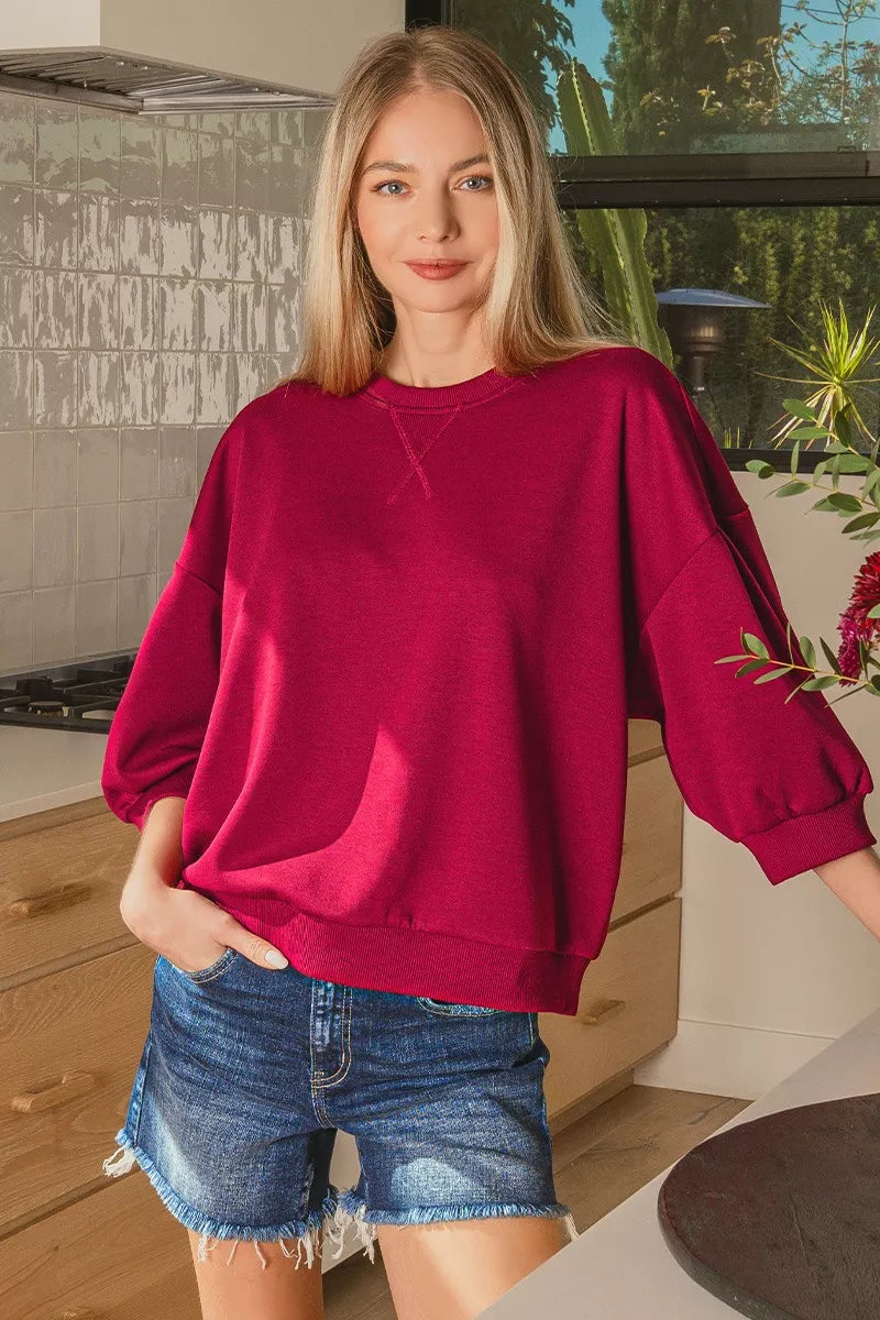 Close up of the dolman sleeve on the scuba sweatshirt