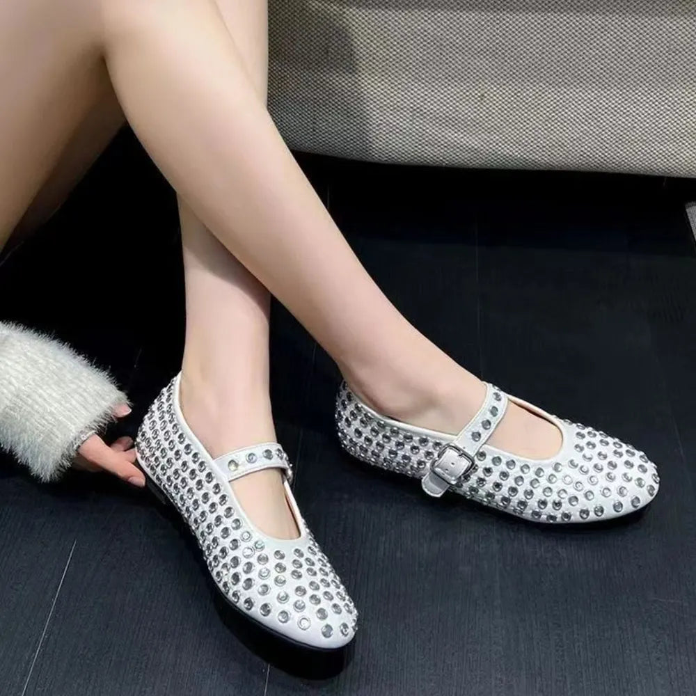Womens studded flat loafers pair