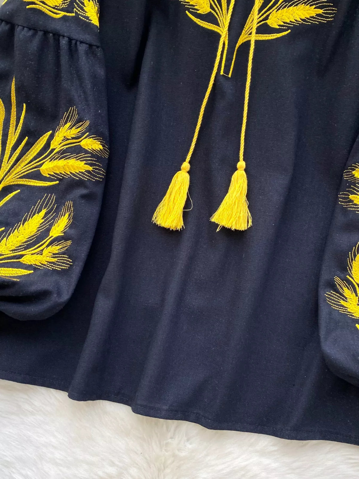 embroidered wheat pattern tie neck blouse on model
