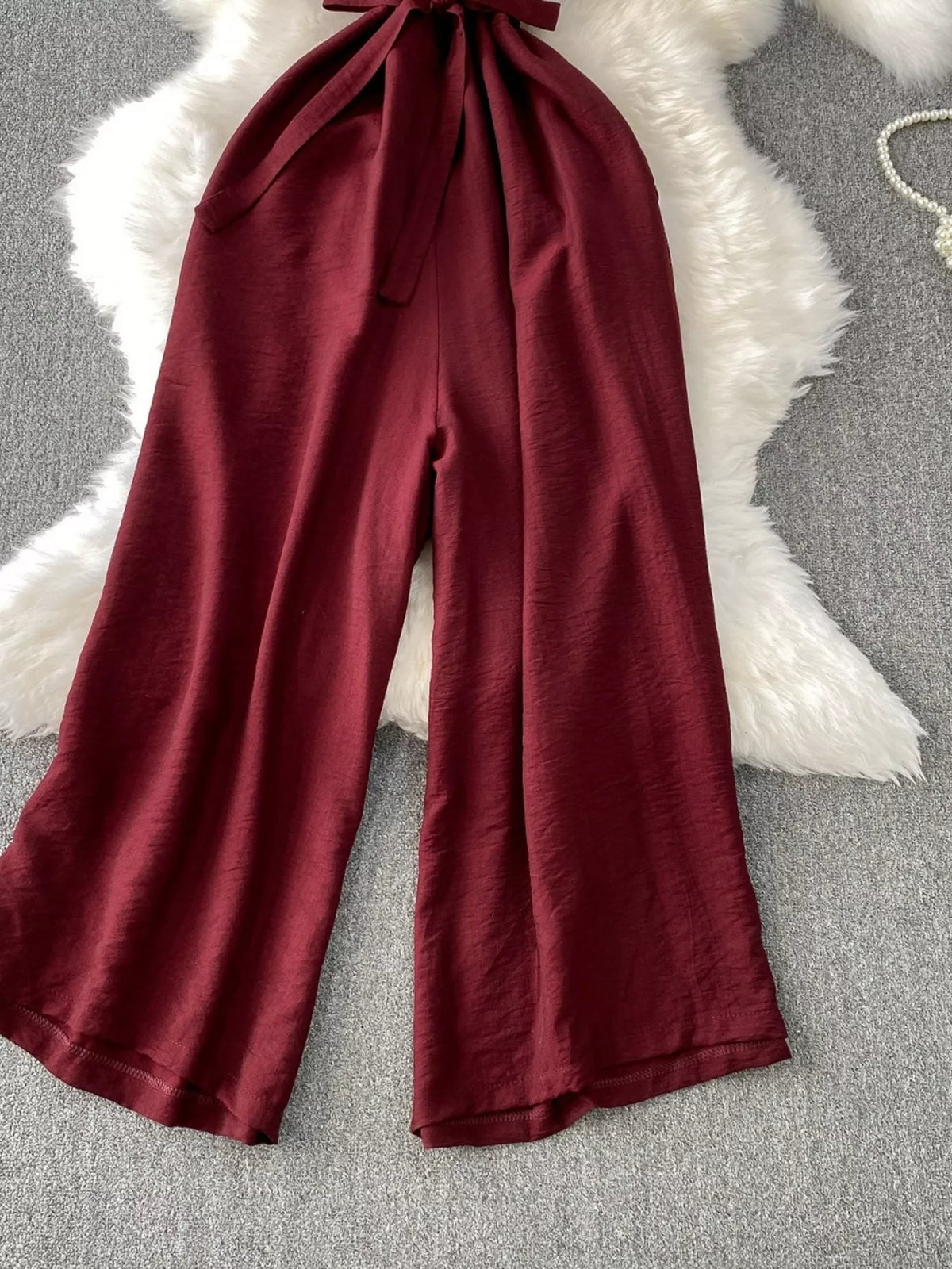 Green belted jumpsuit styled view
