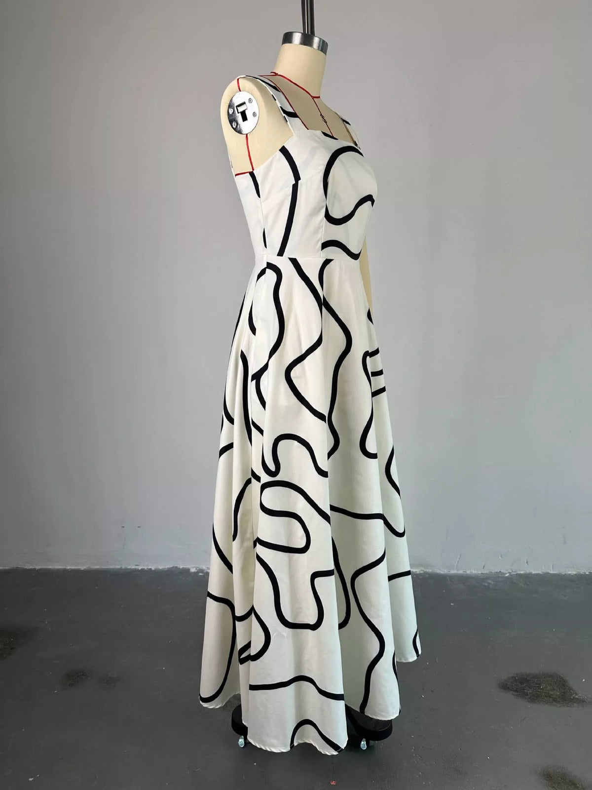 Back view of the square neck abstract print dress