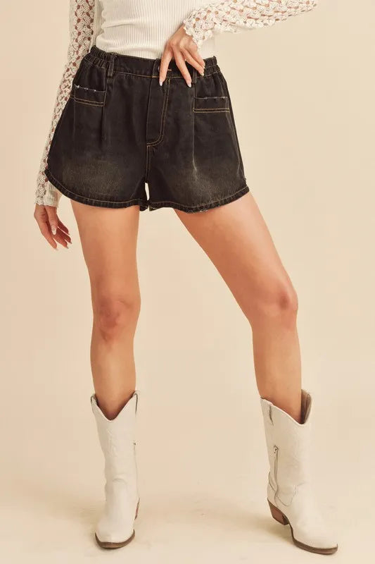 Frayed hem black denim shorts front view