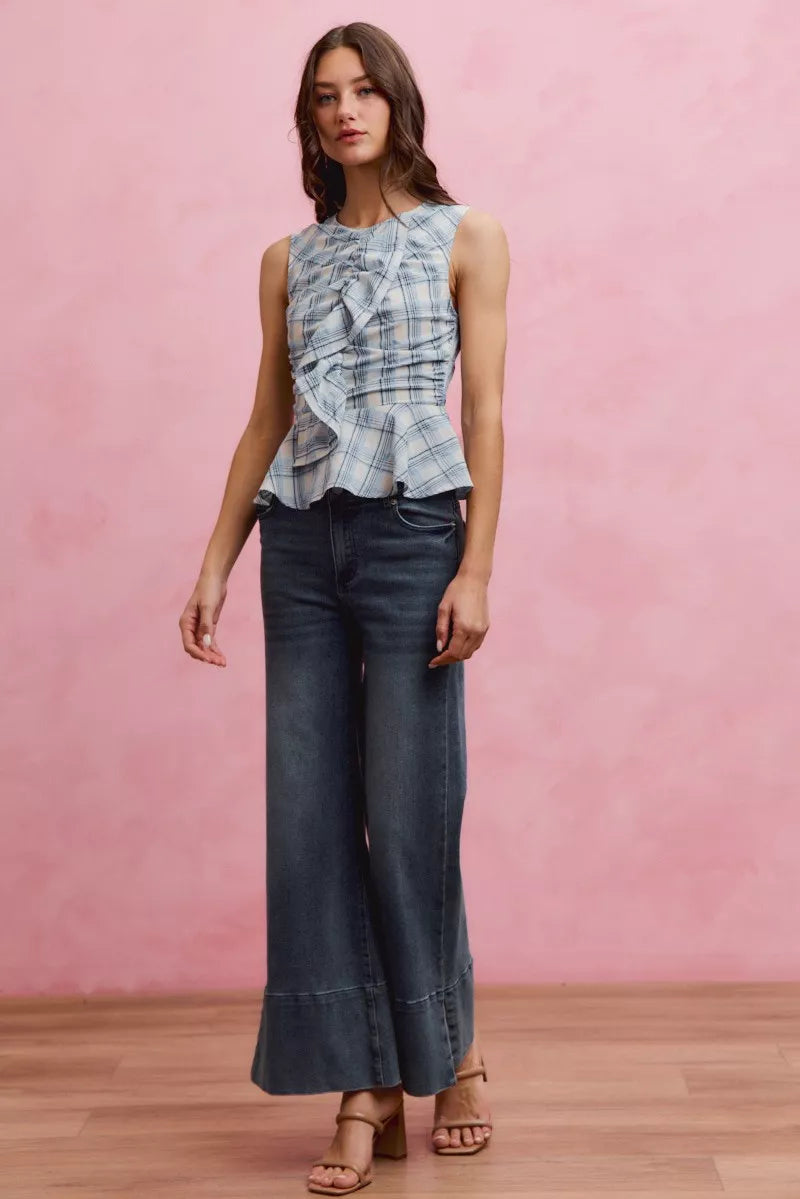 Blue plaid sleeveless ruffle peplum top front view