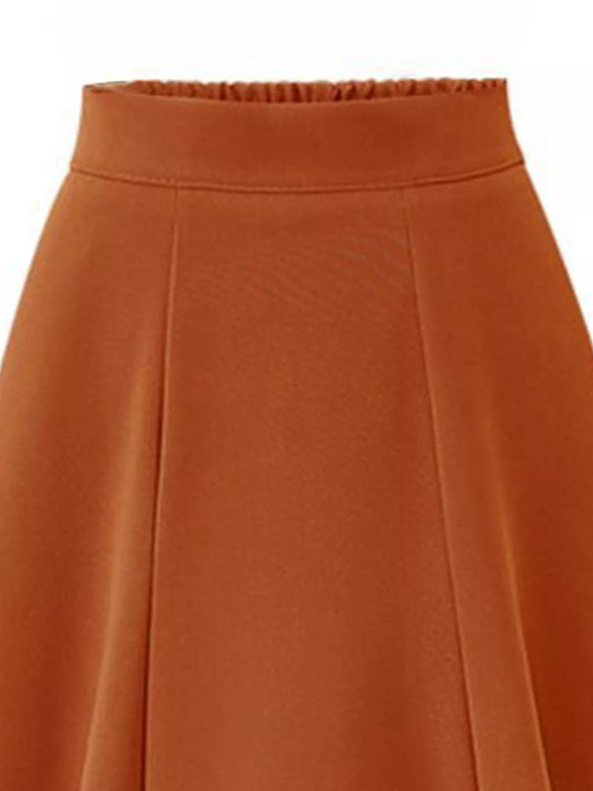 Close up of the smocked elastic waistband on the skirt