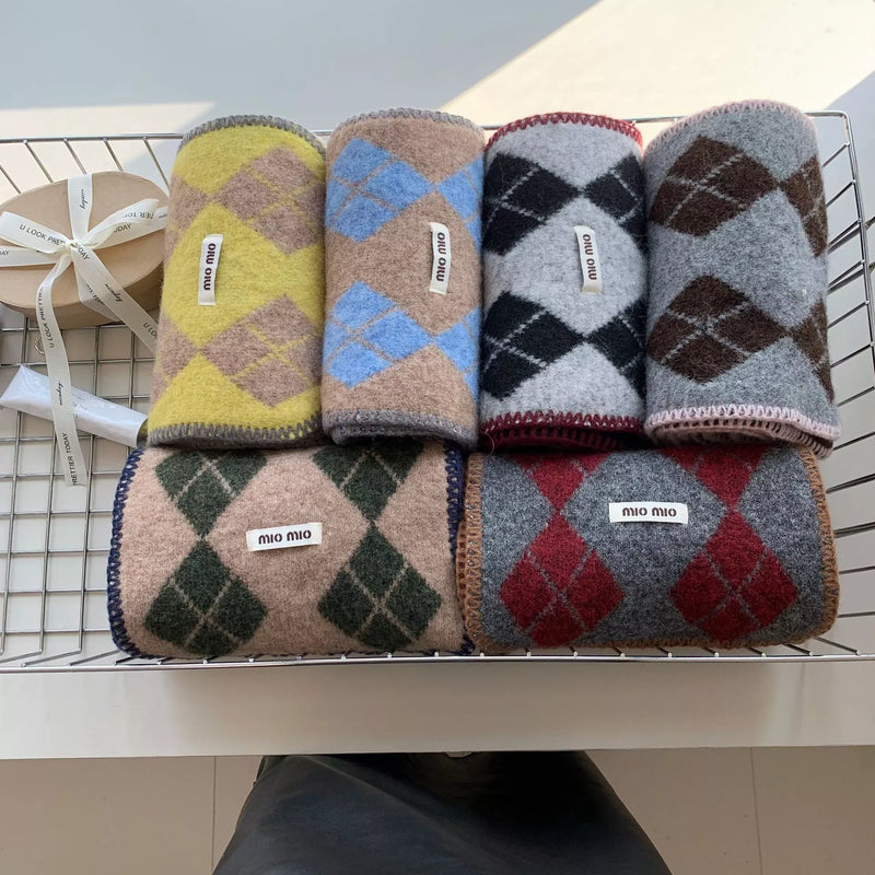 Argyle pattern warm scarf shown around the neck
