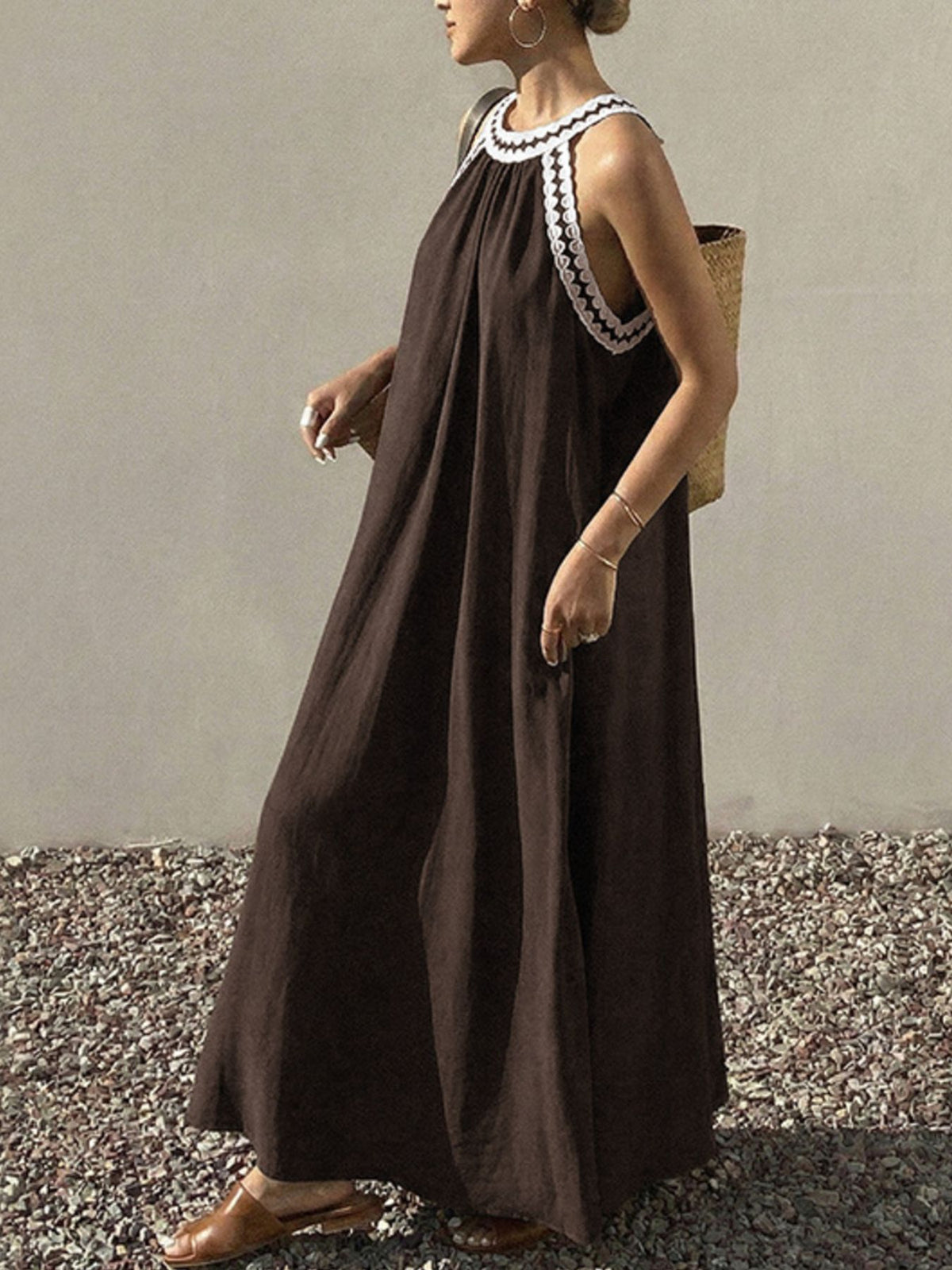 Side view showing the wide sweeping hem of the dress