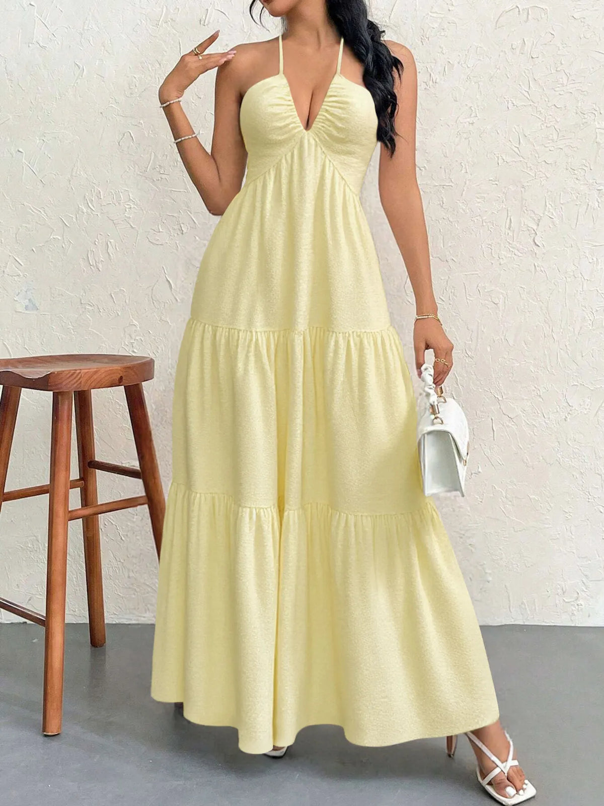 halter neck tiered backless maxi dress flat lay
