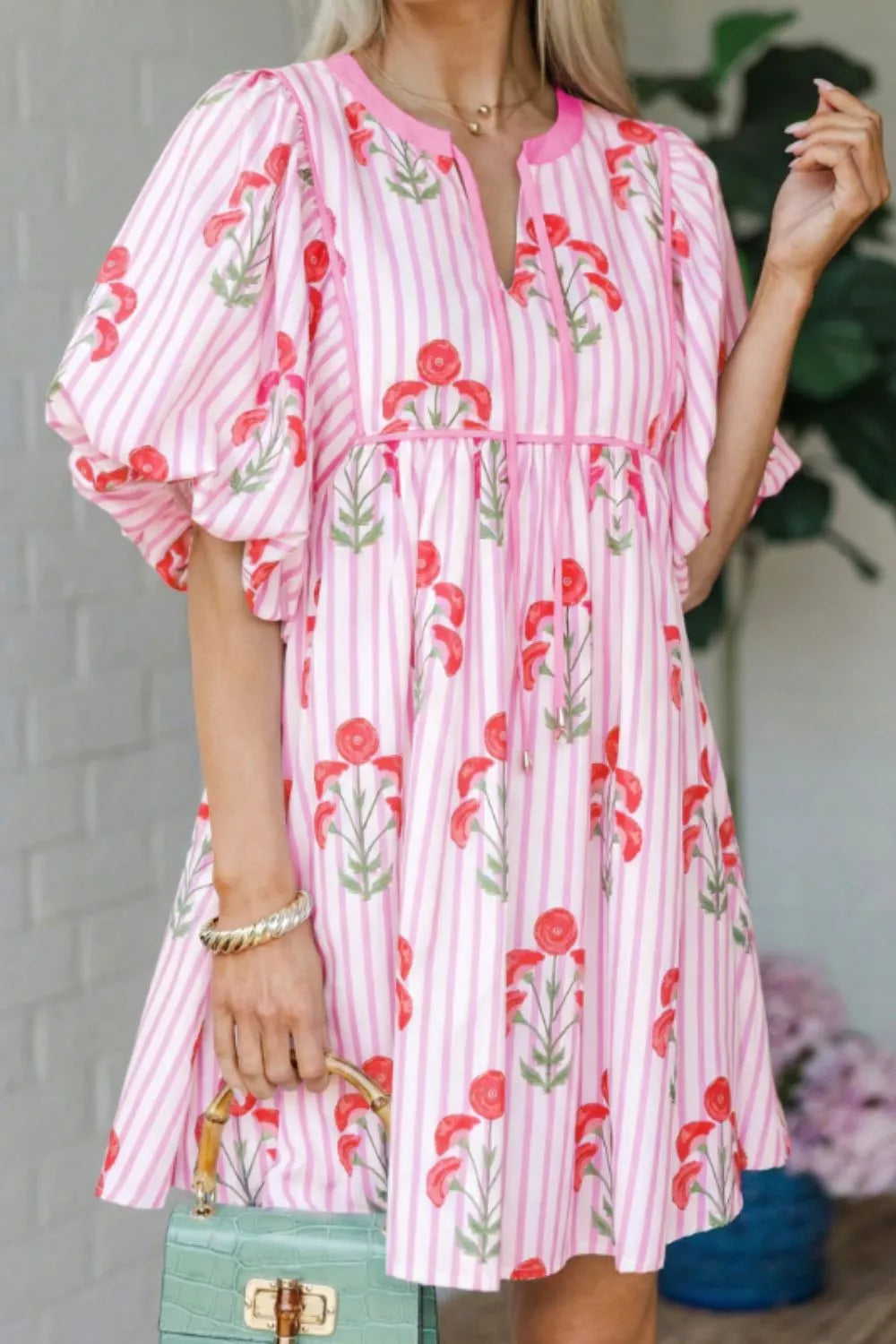Blush pink striped floral mini dress front view