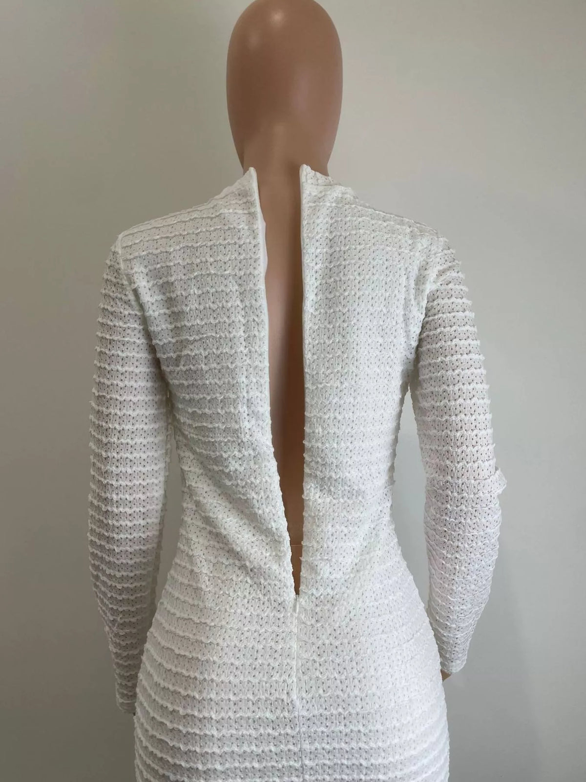 Back view of the white textured button dress