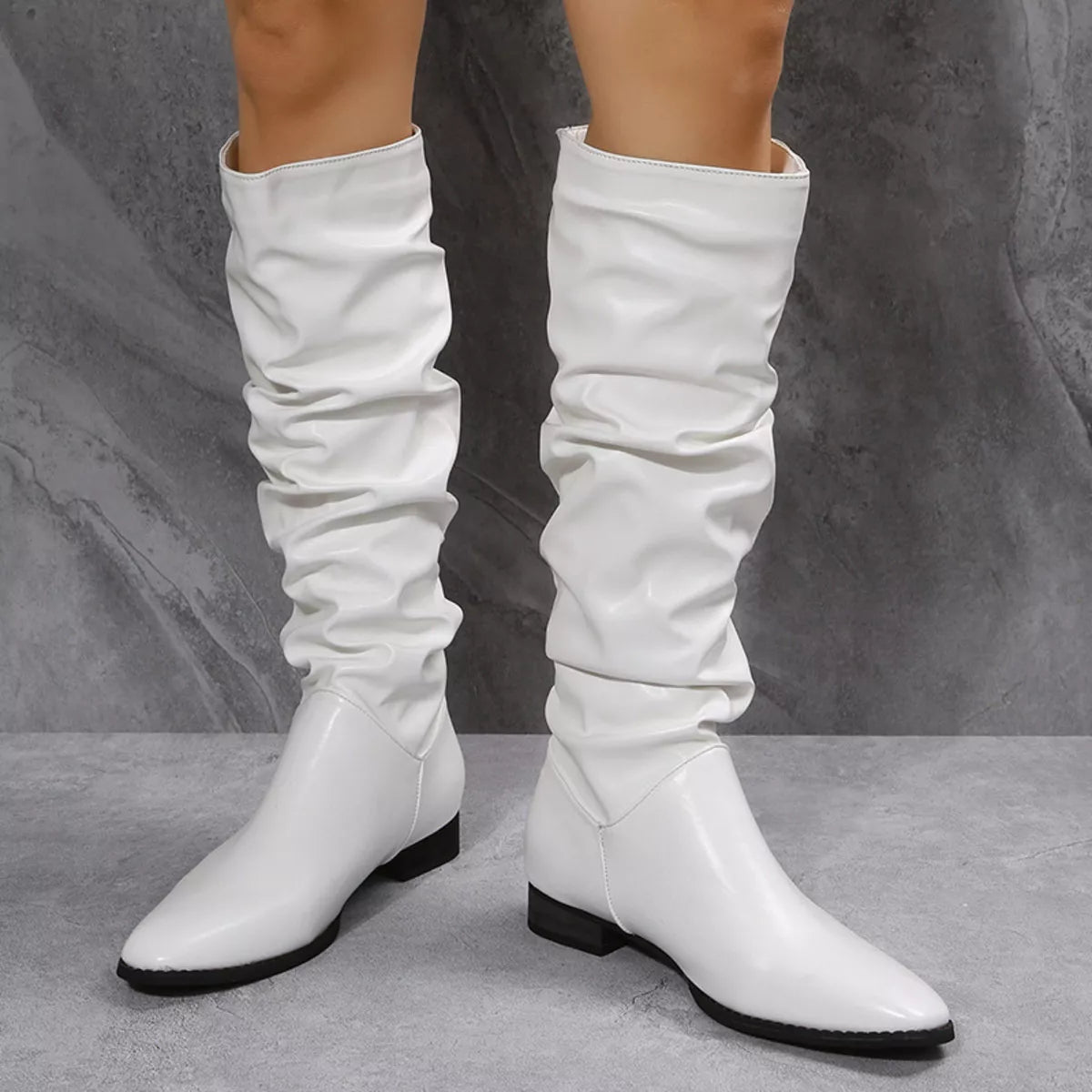 White slouchy block heel boots side profile