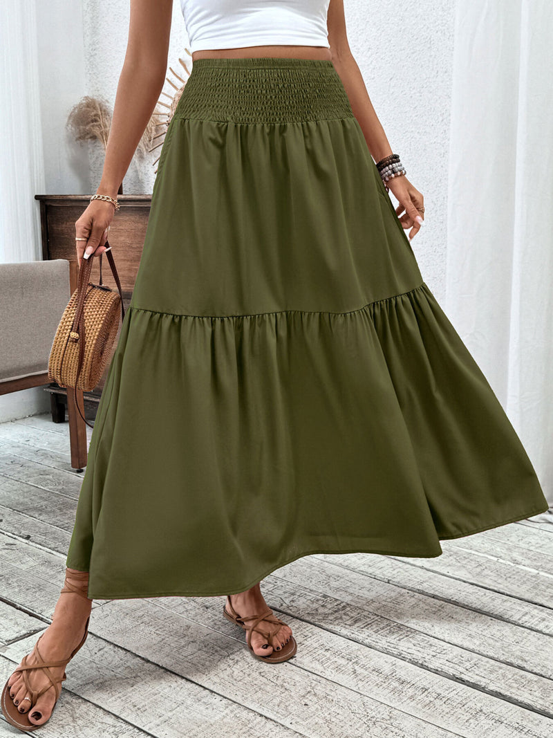 Smocked waist tiered skirt shown full length on model