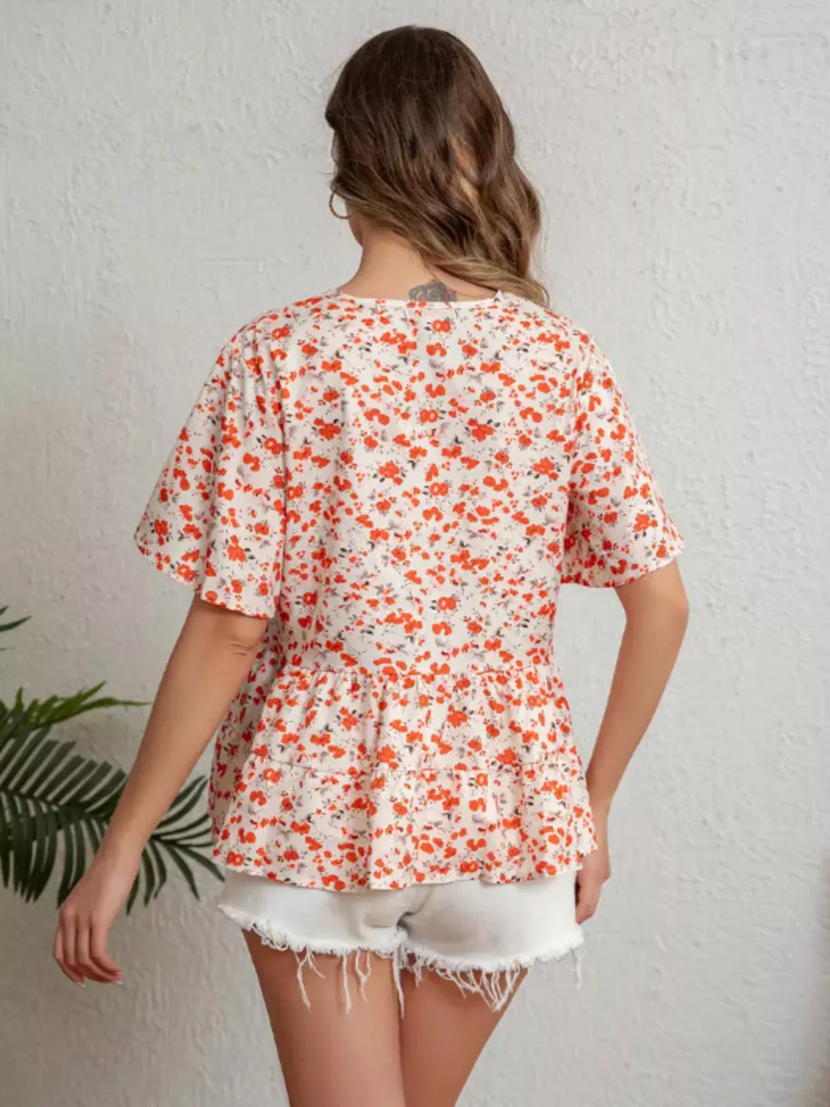 Floral print V neck ruffle sleeve peplum blouse side view