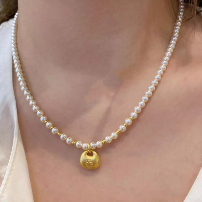 pearl necklace with gold pendant main view