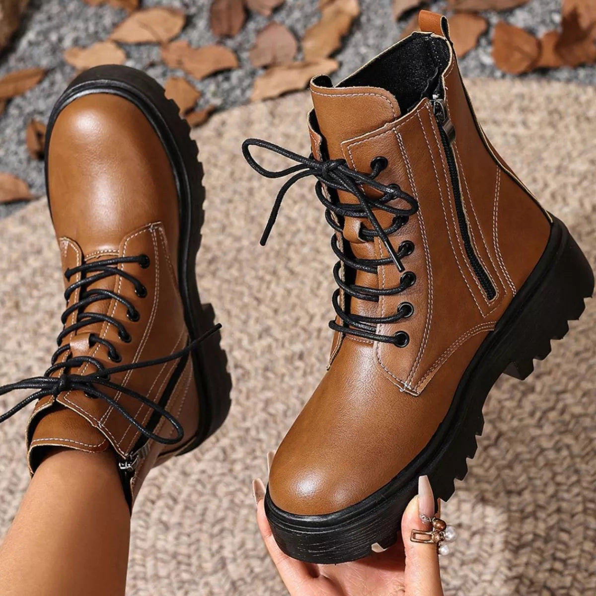 Pink round toe block heels boots angled three quarter view