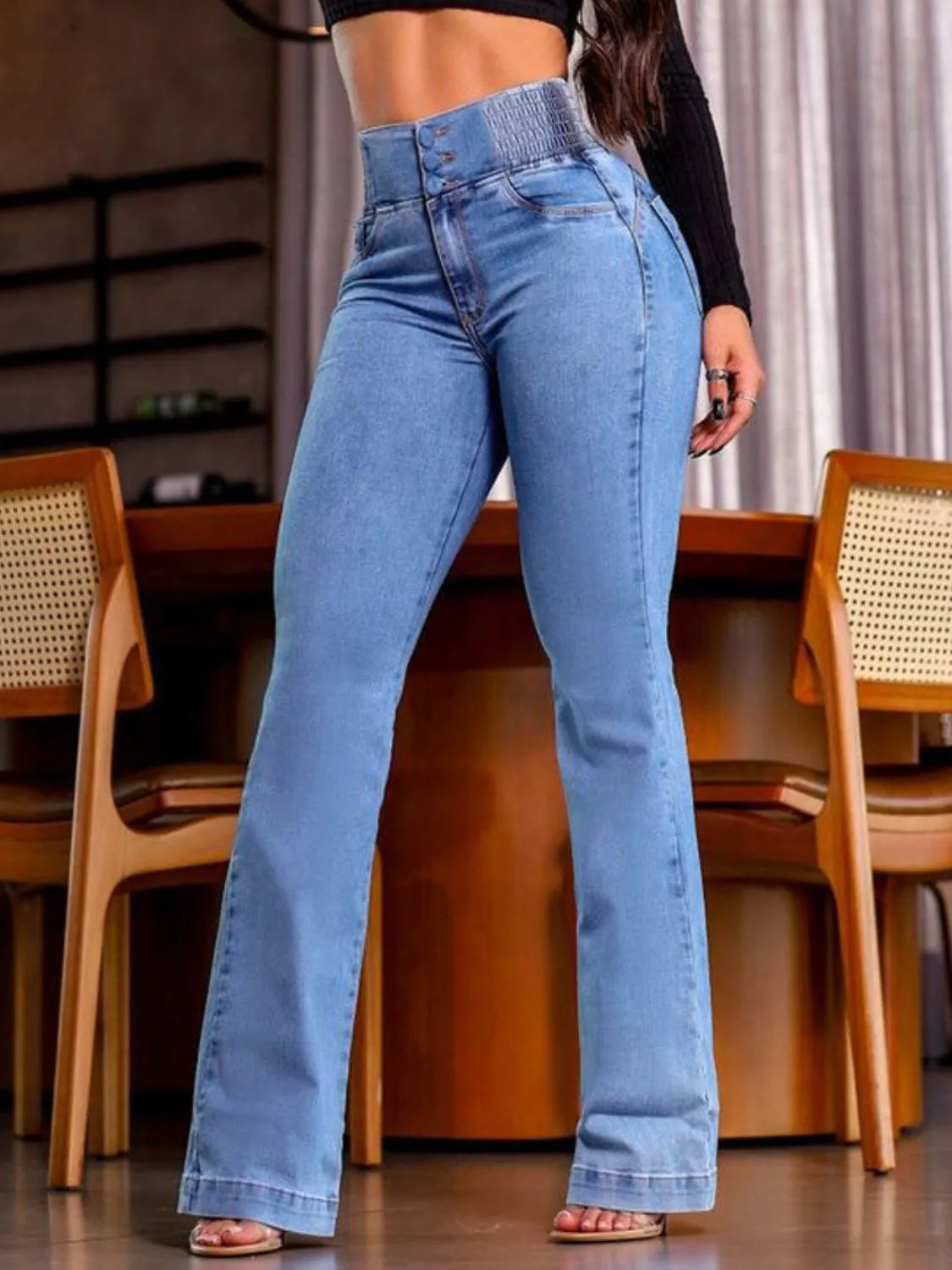 Back view of smocked bootcut jeans
