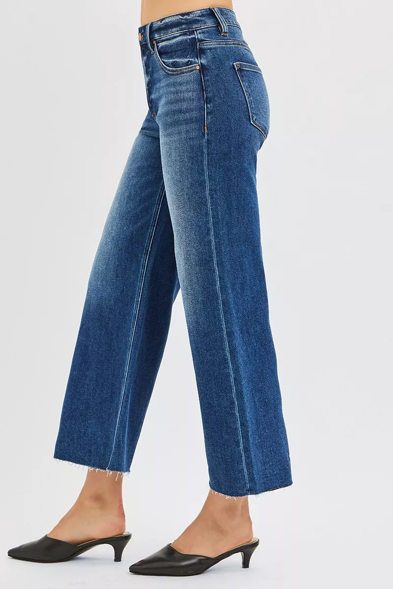 Close up of raw cut hem detail on RISEN wide leg jeans