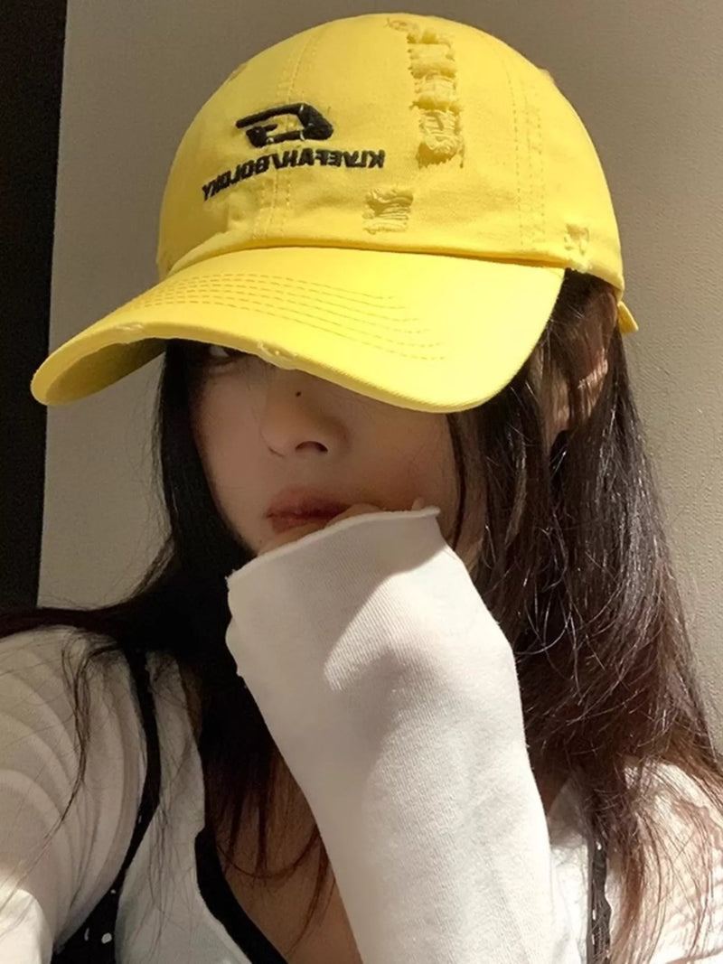 Casual embroidered baseball cap in yellow front view