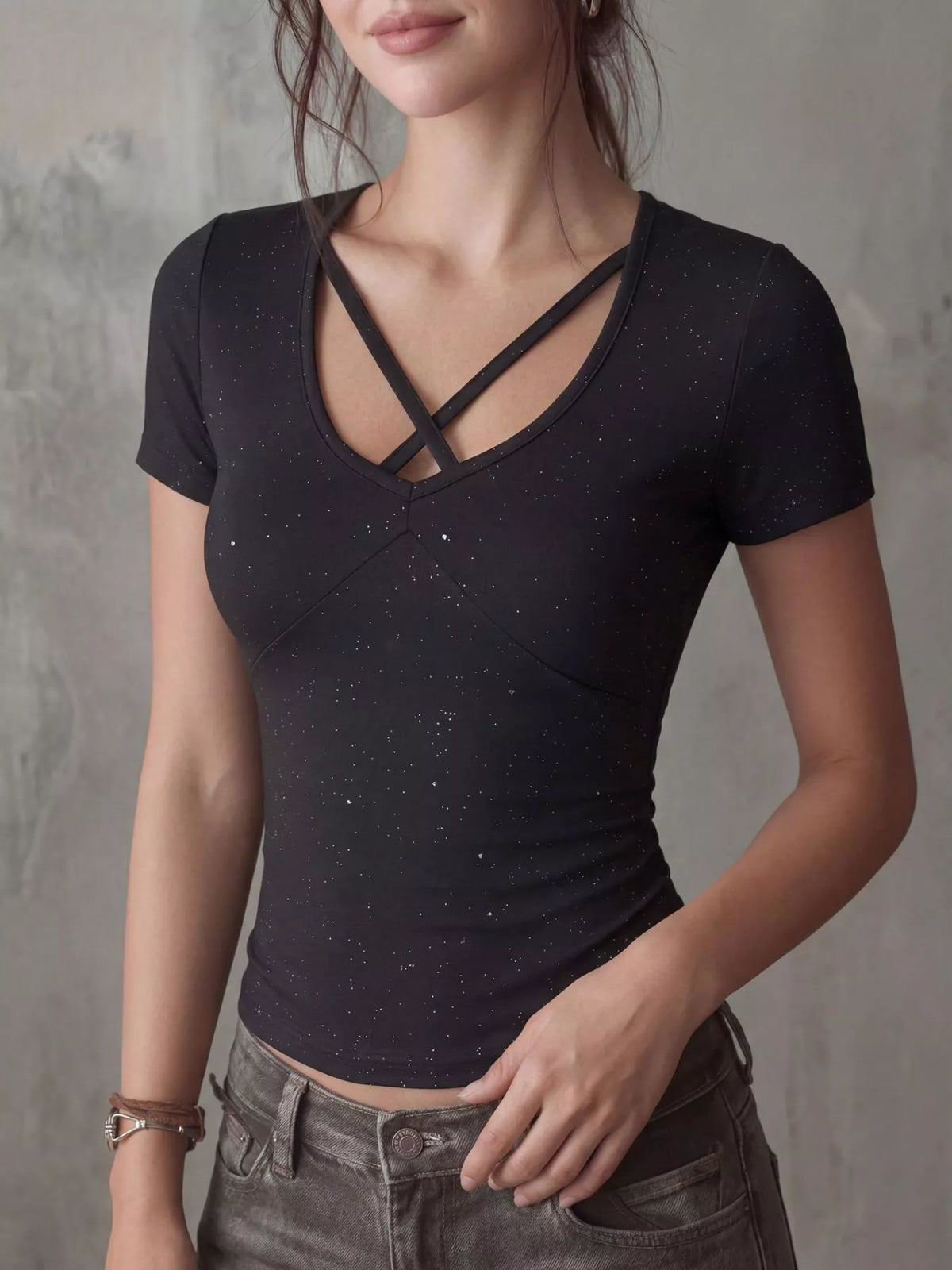 Black crossover short sleeve fitted tee styled on model
