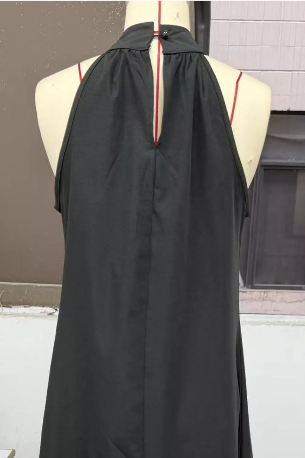 Halter neck sleeveless maxi dress with side slit fabric texture