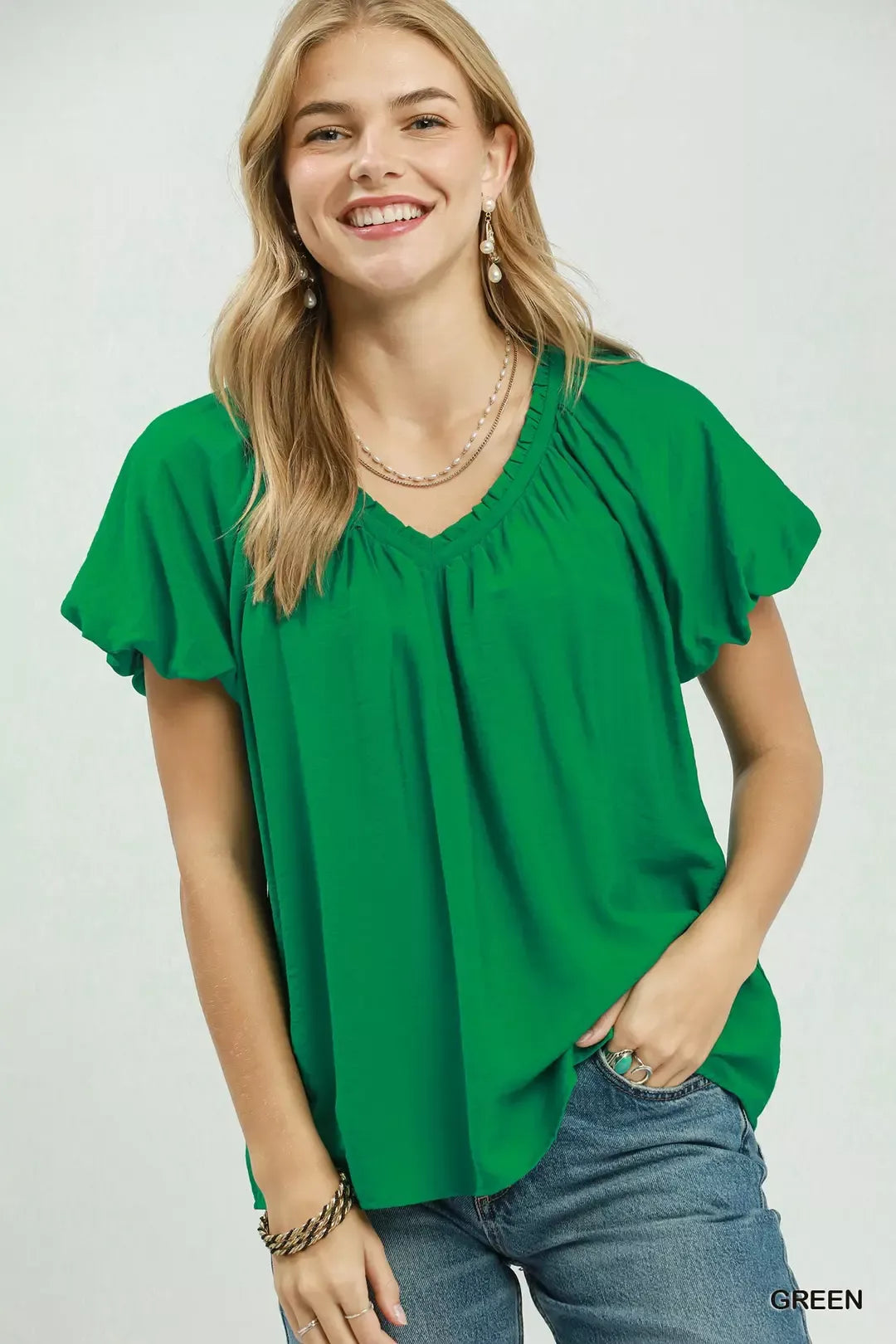 green gathered V neck top front view