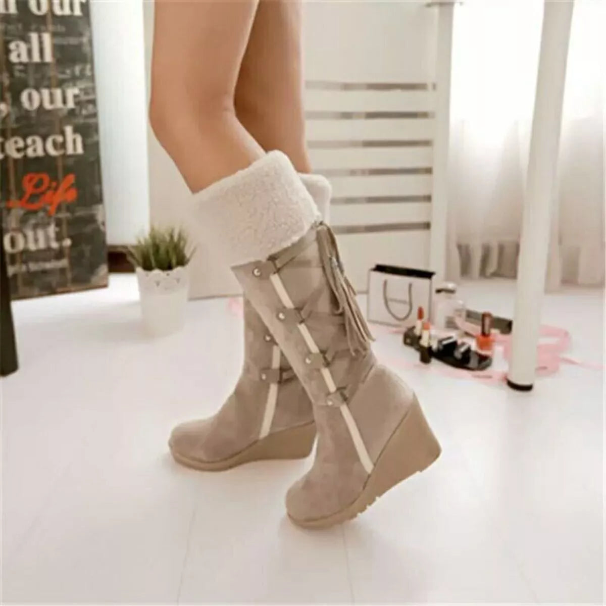 Round toe wedge boots toe close up