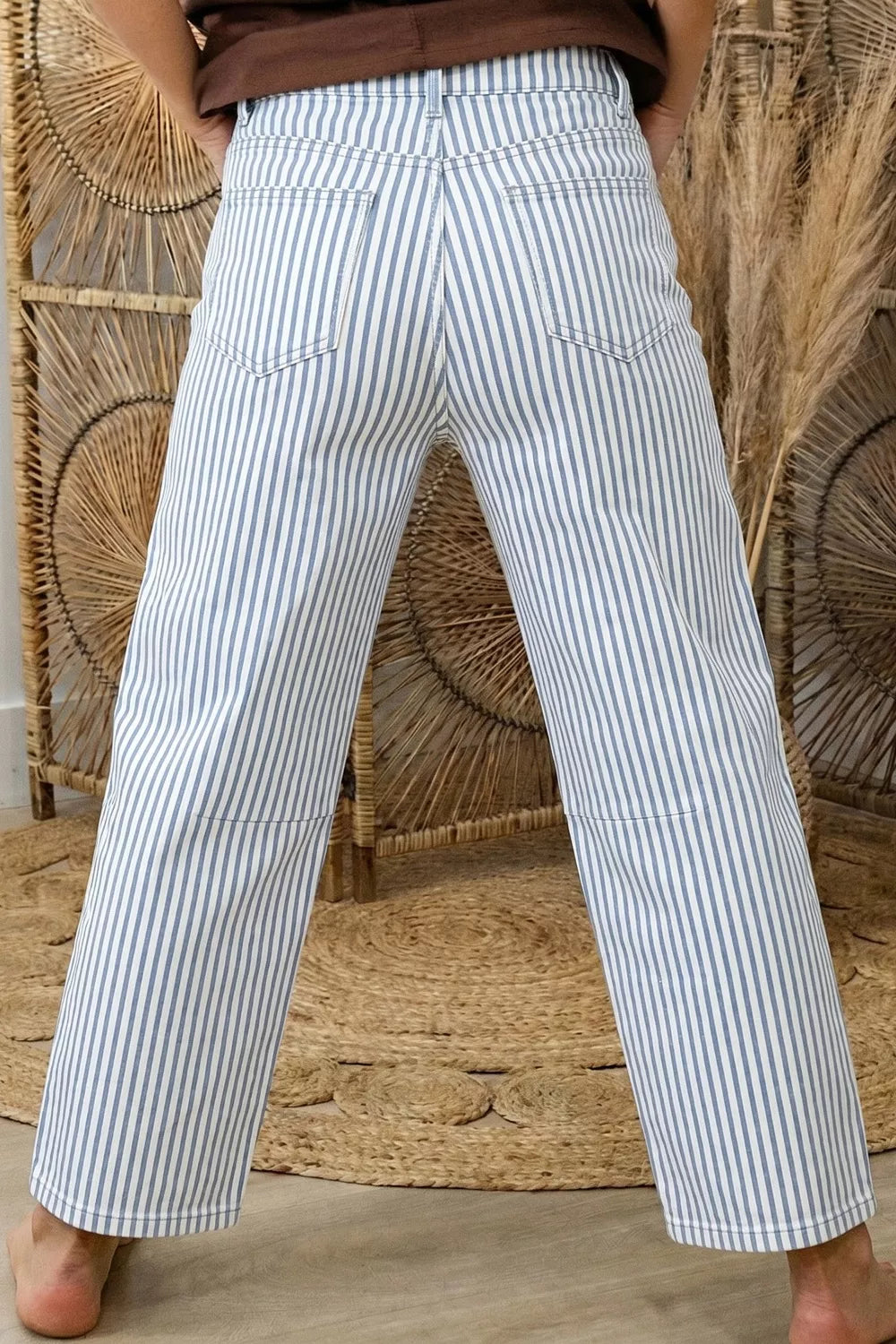 Light wash striped jeans tapered hem detail