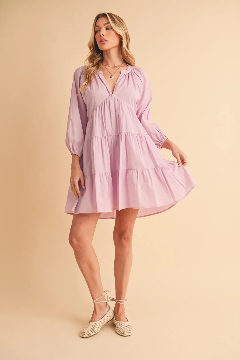 Cotton fabric texture on lilac mini dress