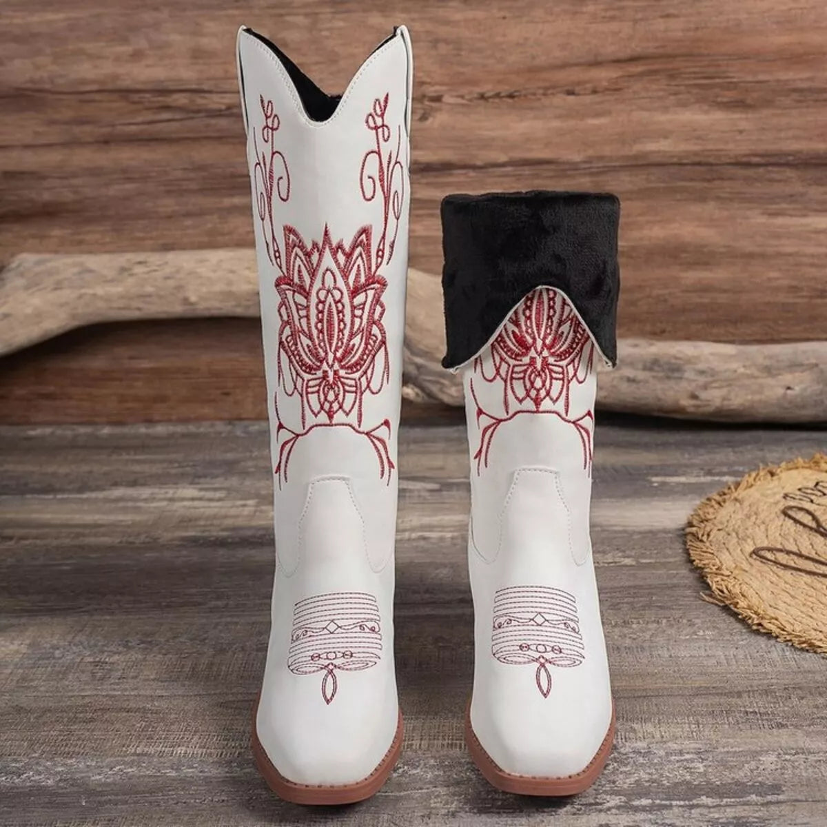 Embroidered western block heel boots outsole view