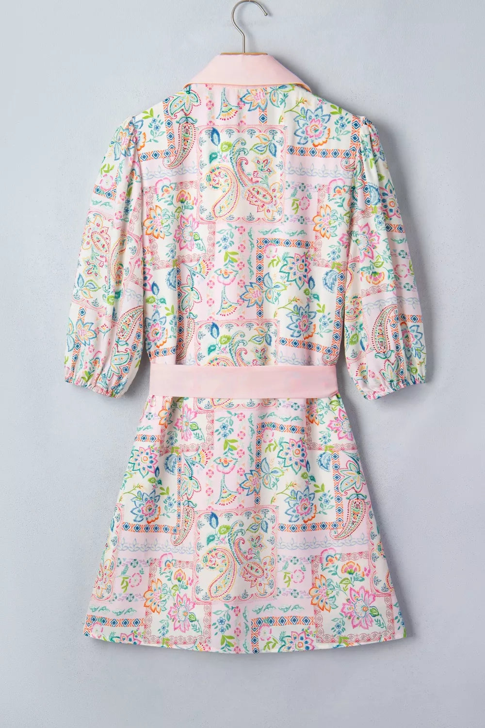 Blush pink floral print belted mini dress detail view